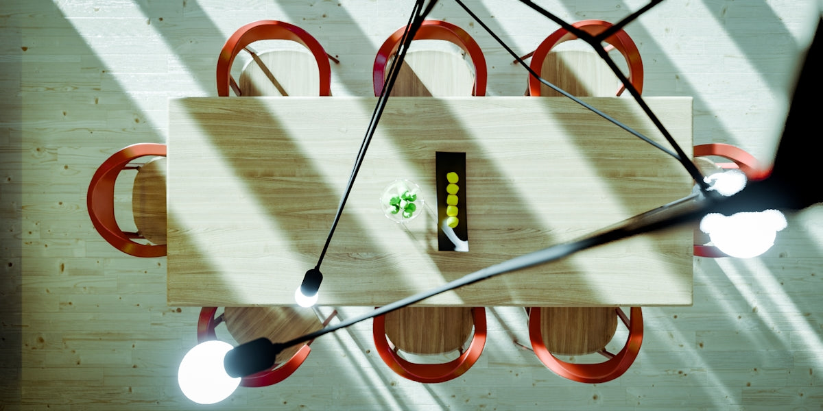 an overhead view of a wooden table with lights on it