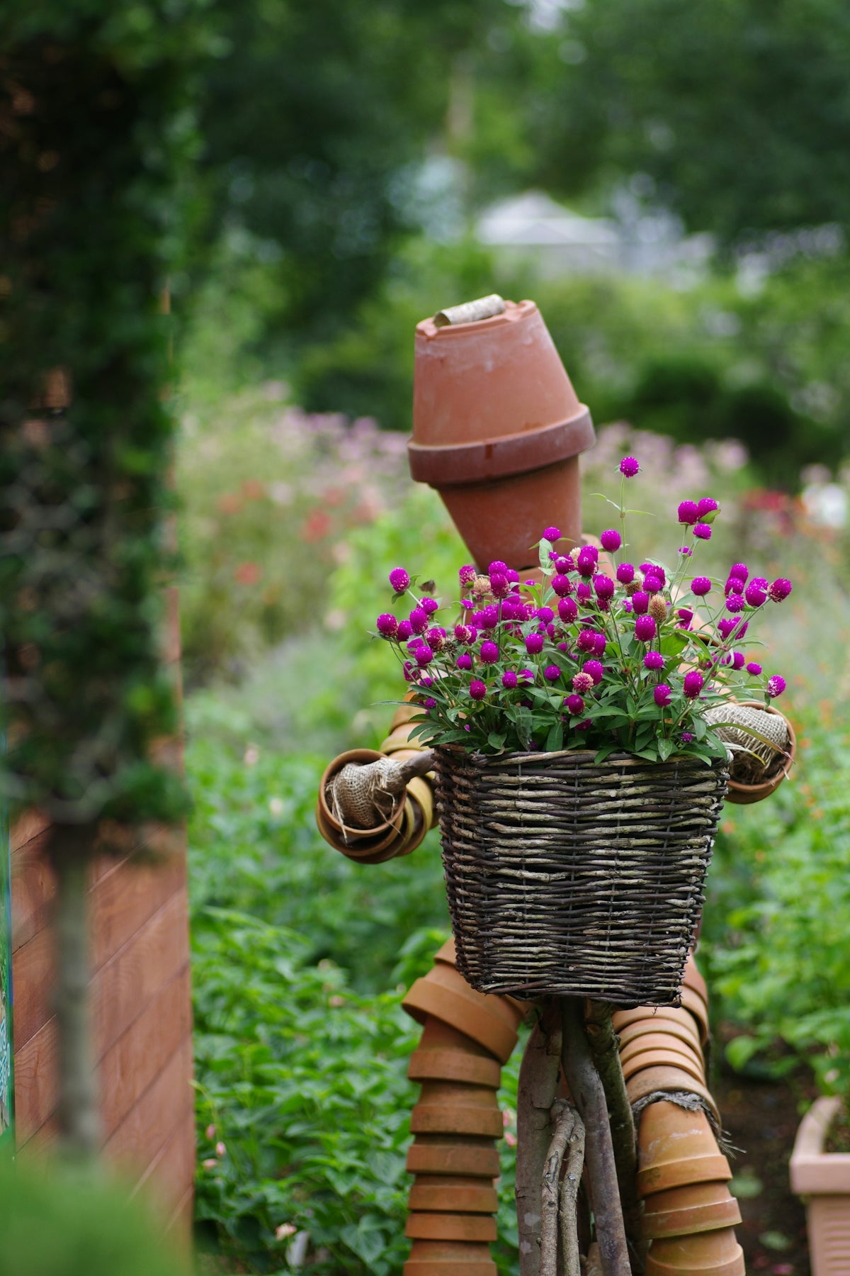 A basket of flowers sitting on top of a bike