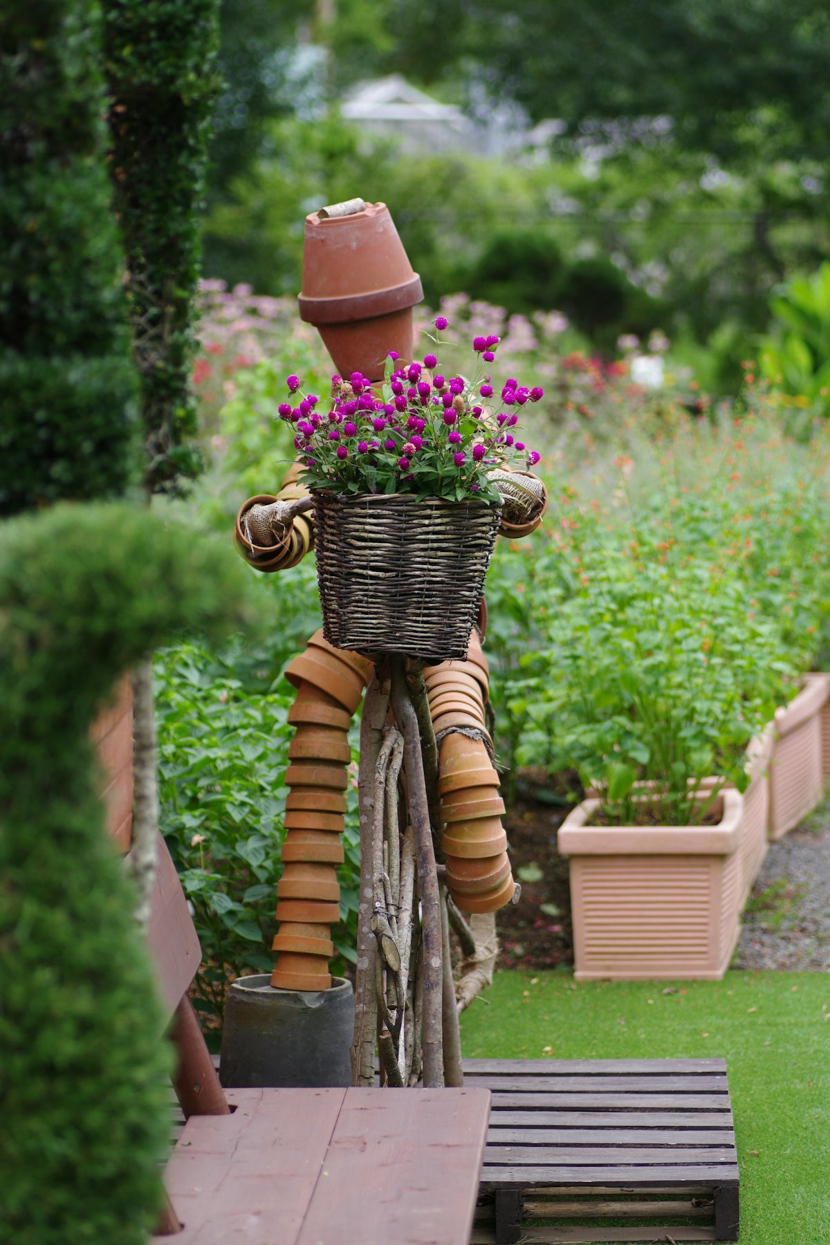 A bicycle with a basket of flowers on the back